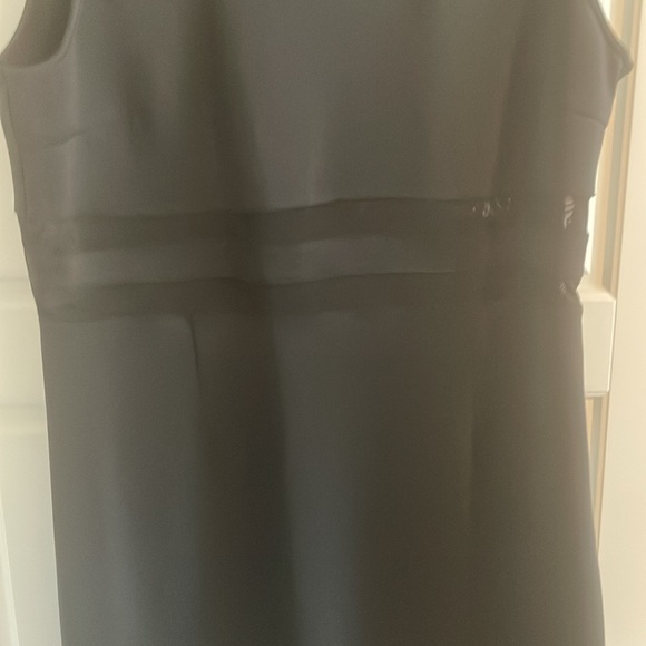 New without tags. Black mesh cut out dress by Spense. Size 12. - Picture 9 of 10